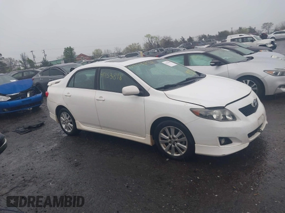 2010 Toyota Corolla with VIN 2T1BU4EEXAC413978, listed as a IAAI auction lot 41953898 with 121,676 mi miles. Bid and sale history available at carsss.com. Image 14.