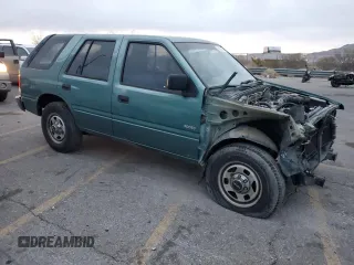 1996 Isuzu Rodeo z VIN 4S2CK58E1T4331031, wystawiony jako Copart lot #78573514 z przebiegiem 218 994 mil mil oraz Szkody całkowita. Historia ofert i sprzedaży dostępna na DreamBid. Obrazek 4.