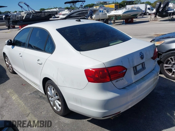 2012 Volkswagen Jetta Sedan SE w/Convenience with VIN 3VWDX7AJ2CM367784, listed as a IAAI auction lot 41386552 with 104,744 mi miles. Bid and sale history available at carsss.com. Image 3.