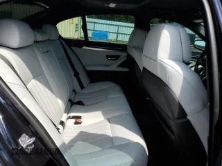 2016 BMW M5 z VIN WBSFV9C55GD595799, wystawiony jako Copart lot #65708864 z przebiegiem 104 198 mil mil oraz Szkoda całkowita • Salvage title. Historia ofert i sprzedaży dostępna na DreamBid. Obrazek 10.