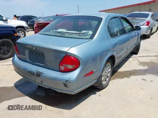 2001 Nissan Maxima GXE with VIN JN1CA31D51T604935, listed as a IAAI auction lot 42504918 with 253,407 mi miles and . Bid and sale history available at DreamBid. Image 4.