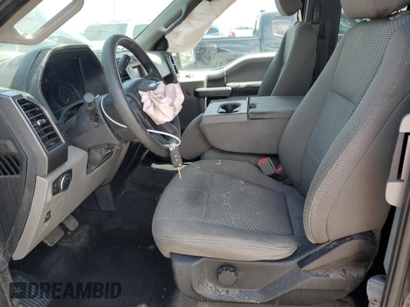 2018 Ford F-150 XL with VIN 1FTEX1EP1JKF38242, listed as a Copart auction lot 53517715 with 134,371 mi miles and Salvage title. Bid and sale history available at DreamBid. Image 7.