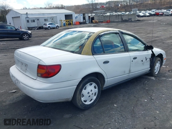 2000 Saturn SL z VIN 1G8ZH5280YZ251280, wystawiony jako IAAI lot #41742836 z przebiegiem 180 249 mil mil oraz . Historia ofert i sprzedaży dostępna na DreamBid. Obrazek 4.