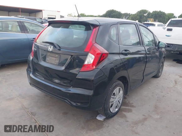 2020 Honda Fit LX z VIN 3HGGK5H40LM717305, wystawiony jako IAAI lot #42093169 z przebiegiem 69 665 mil mil oraz . Historia ofert i sprzedaży dostępna na DreamBid. Obrazek 4.