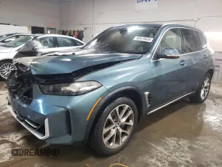 2024 BMW X5 xDrive40i z VIN 5UX23EU07R9V78014, wystawiony jako Copart lot #82619634 z przebiegiem 9 882 mil mil oraz Szkoda całkowita • Salvage title. Historia ofert i sprzedaży dostępna na DreamBid. Obrazek 1.