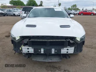 2021 Ford Mustang GT z VIN 1FA6P8CF7M5110160, wystawiony jako IAAI lot #41885188 z przebiegiem 75 799 mil mil oraz . Historia ofert i sprzedaży dostępna na DreamBid. Obrazek 13.