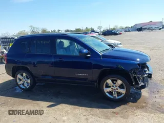 2014 Jeep Compass Latitude with VIN 1C4NJCEB2ED883243, listed as a IAAI auction lot 41989007 with 138,192 mi miles. Bid and sale history available at carsss.com. Image 14.