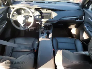 2022 Cadillac XT4 AWD Sport с VIN 1GYFZFR49NF130155, выставлен на аукционе Copart как лот 80286034 с пробегом 28 447 миль миль и Списание • Salvage title. История ставок и продаж доступна на DreamBid. Изображение 8.