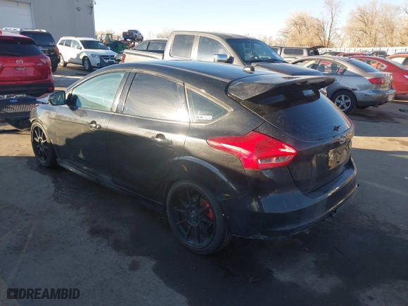 2015 Ford Focus ST with VIN 1FADP3L95FL339181, listed as a IAAI auction lot 41397051 with 124,656 mi miles. Bid and sale history available at carsss.com. Image 3.
