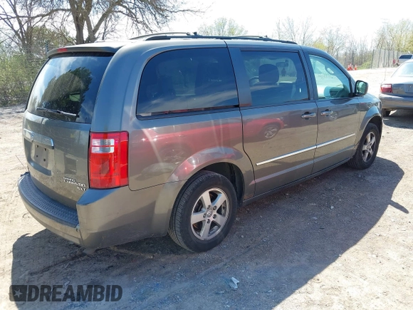 2010 Dodge Grand Caravan SXT with VIN 2D4RN5D1XAR293862, listed as a IAAI auction lot 42179737 with 324,144 mi miles and . Bid and sale history available at DreamBid. Image 4.