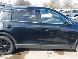 2023 Mazda CX-9 Touring Plus with VIN JM3TCBAY2P0657761, listed as a IAAI auction lot 41125586 with 12,425 mi miles and . Bid and sale history available at DreamBid. Image 14.