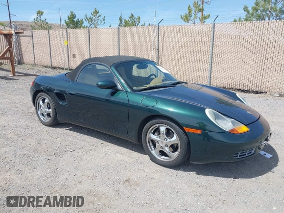 1999 Porsche Boxster with VIN WP0CA2986XU627495, listed as a IAAI auction lot 42112724 with 94,090 mi miles and . Bid and sale history available at DreamBid. Image 1.