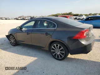 2015 Volvo S60 T6 Drive-E with VIN YV149MFK7F1343313, listed as a Copart auction lot 76279894 with 60,091 mi miles and Salvage Title. Bid and sale history available at carsss.com. Image 2.
