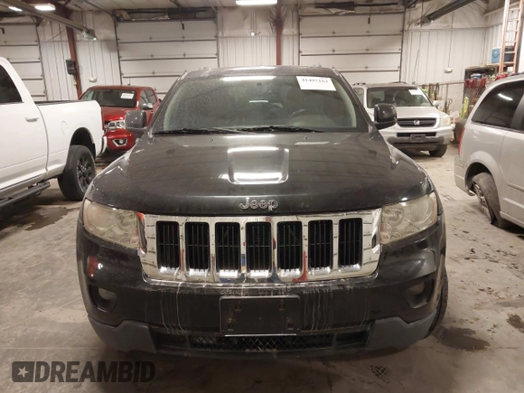 2012 Jeep Grand Cherokee Laredo with VIN 1C4RJFAG6CC266144, listed as a IAAI auction lot 41497163 with 233,755 mi miles. Bid and sale history available at carsss.com. Image 13.