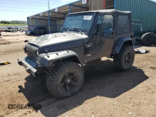 2000 Jeep Wrangler SE z VIN 1J4FA29P1YP787363, wystawiony jako Copart lot #63854015 z przebiegiem 172 765 mil mil oraz Szkoda całkowita • Salvage title. Historia ofert i sprzedaży dostępna na DreamBid. Obrazek 1.