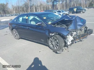 2016 Toyota Avalon Hybrid XLE Premium with VIN 4T1BD1EB2GU052127, listed as a IAAI auction lot 41737260 with 266,841 mi miles. Bid and sale history available at carsss.com. Image 1.
