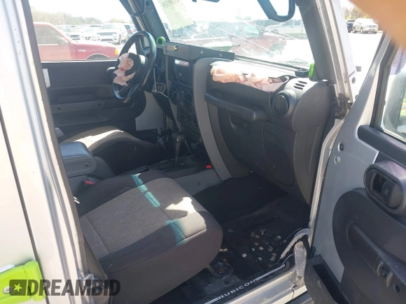 2008 Jeep Wrangler Unlimited Rubicon with VIN 1J4GA691X8L555097, listed as a IAAI auction lot 41889319 with 166,882 mi miles and . Bid and sale history available at DreamBid. Image 5.