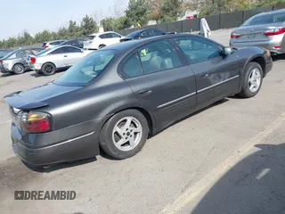 2003 Pontiac Bonneville SE z VIN 1G2HX52K934181238, wystawiony jako IAAI lot #41483636 z przebiegiem 176 737 mil mil oraz . Historia ofert i sprzedaży dostępna na DreamBid. Obrazek 4.