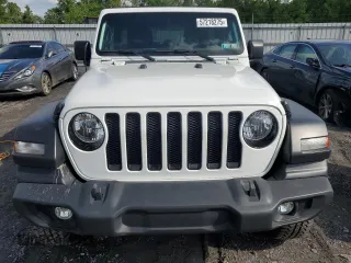 2021 Jeep Wrangler Unlimited Sport S with VIN 1C4HJXDG3MW583165, listed as a Copart auction lot 57218275 with 74,353 mi miles and Salvage title. Bid and sale history available at DreamBid. Image 5.