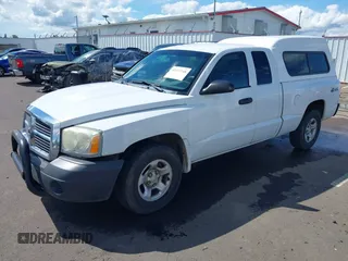 2005 Dodge Dakota ST with VIN 1D7HW22K15S119947, listed as a IAAI auction lot 42372148 with 140,528 mi miles and . Bid and sale history available at DreamBid. Image 2.