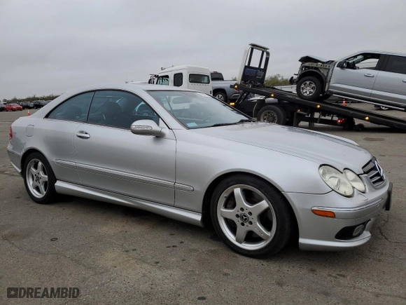 2004 Mercedes-Benz CLK-Class 5.0L with VIN WDBTJ75J04F110990, listed as a Copart auction lot 85511414 with 251,096 mi miles and Salvage Title. Bid and sale history available at carsss.com. Image 4.