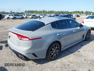 2023 Kia Stinger GT-Line with VIN KNAE35LD3P6136247, listed as a IAAI auction lot 41969093 with 27,905 mi miles. Bid and sale history available at carsss.com. Image 4.