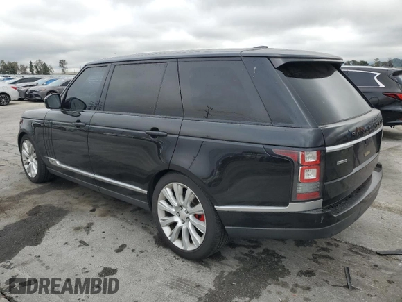 2014 Land Rover Range Rover Supercharged with VIN SALGS3TF0EA165129, listed as a Copart auction lot 50652275 with 121,131 mi miles and Salvage title. Bid and sale history available at DreamBid. Image 2.
