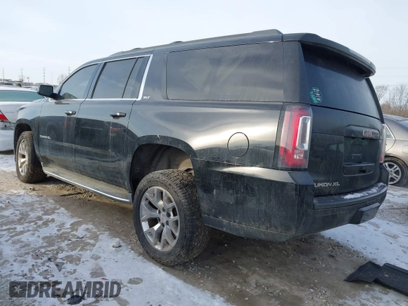 2015 GMC Yukon XL SLT with VIN 1GKS2HKC6FR257133, listed as a IAAI auction lot 41385913 with 150,238 mi miles. Bid and sale history available at carsss.com. Image 3.