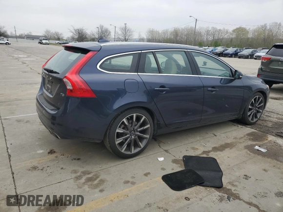 2015 Volvo V60 T5 Drive-E Premier Plus z VIN YV140MEC6F1213575, wystawiony jako Copart lot #52224865 z przebiegiem 78 702 mil mil oraz Szkoda całkowita • Salvage title. Historia ofert i sprzedaży dostępna na DreamBid. Obrazek 3.