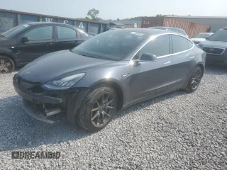 2018 Tesla Model 3 Long Range Battery z VIN 5YJ3E1EB0JF114050, wystawiony jako Copart lot #59002935 z przebiegiem 106 991 mil mil oraz Czysty tytuł • Clean title. Historia ofert i sprzedaży dostępna na DreamBid. Obrazek 1.