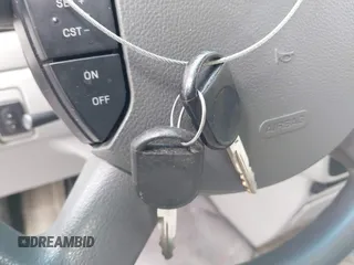 2004 Ford Freestar SES z VIN 2FMZA57604BA08613, wystawiony jako IAAI lot #41712298 z przebiegiem 183 791 mil mil oraz . Historia ofert i sprzedaży dostępna na DreamBid. Obrazek 11.
