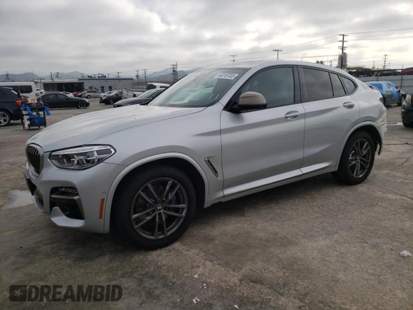 2020 BMW X4 M40i z VIN 5UX2V5C02L9B14571, wystawiony jako Copart lot #44318703 z przebiegiem 14 861 mil mil oraz . Historia ofert i sprzedaży dostępna na DreamBid. Obrazek 1.