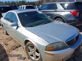 2002 Lincoln LS w/Base Pkg z VIN 1LNHM87A82Y641255, wystawiony jako IAAI lot #41596488 z przebiegiem Nie podano mil oraz . Historia ofert i sprzedaży dostępna na DreamBid. Obrazek 1.