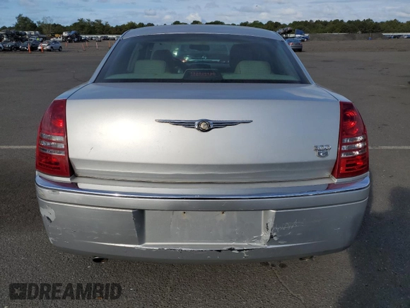 2006 Chrysler 300 C with VIN 2C3KK63H46H296625, listed as a Copart auction lot 70220974 with 104,811 mi miles and Salvage Title. Bid and sale history available at carsss.com. Image 6.