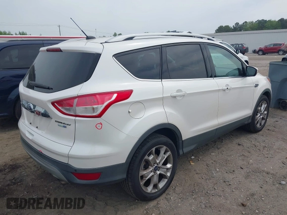 2016 Ford Escape Titanium with VIN 1FMCU9JX6GUB50226, listed as a IAAI auction lot 42033033 with 108,782 mi miles and . Bid and sale history available at DreamBid. Image 4.