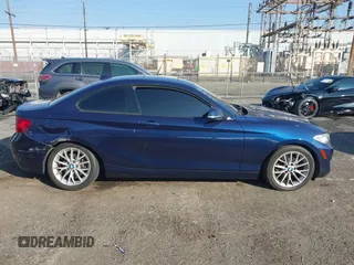 2015 BMW 2 Series 228i xDrive with VIN WBA1F7C5XFV367287, listed as a IAAI auction lot 40802463 with 113,427 mi miles and . Bid and sale history available at carsss.com. Image 13.
