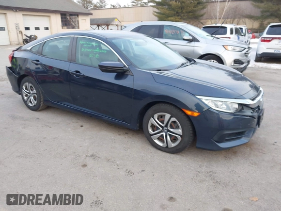 2017 Honda Civic LX z VIN 19XFC2F52HE028823, wystawiony jako IAAI lot #41312009 z przebiegiem 56 462 mil mil oraz . Historia ofert i sprzedaży dostępna na DreamBid. Obrazek 1.