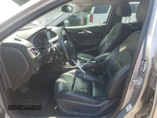 2018 Infiniti QX30 Premium with VIN SJKCH5CP2JA057174, listed as a Copart auction lot 55574085 with 111,733 mi miles and Salvage title. Bid and sale history available at DreamBid. Image 7.