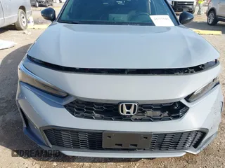 2025 Honda Civic Sport Touring z VIN 19XFL4H94SE000539, wystawiony jako IAAI lot #41777545 z przebiegiem 7 128 mil mil oraz . Historia ofert i sprzedaży dostępna na DreamBid. Obrazek 17.