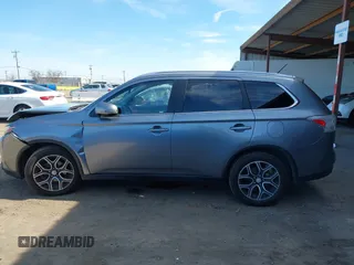2015 Mitsubishi Outlander GT with VIN JA4JZ4AX1FZ005879, listed as a IAAI auction lot 41701299 with 212,805 mi miles and . Bid and sale history available at DreamBid. Image 14.