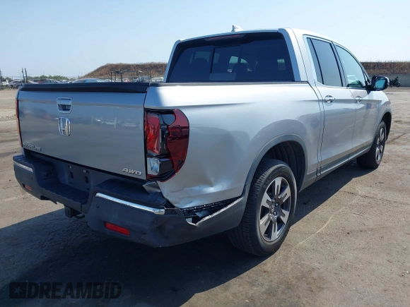2019 Honda Ridgeline RTL-E with VIN 5FPYK3F79KB029771, listed as a IAAI auction lot 42448369 with 90,142 mi miles and . Bid and sale history available at DreamBid. Image 6.