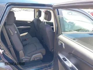 2013 Dodge Journey American Value with VIN 3C4PDCAB5DT561632, listed as a IAAI auction lot 42414827 with Not provided miles and . Bid and sale history available at DreamBid. Image 8.