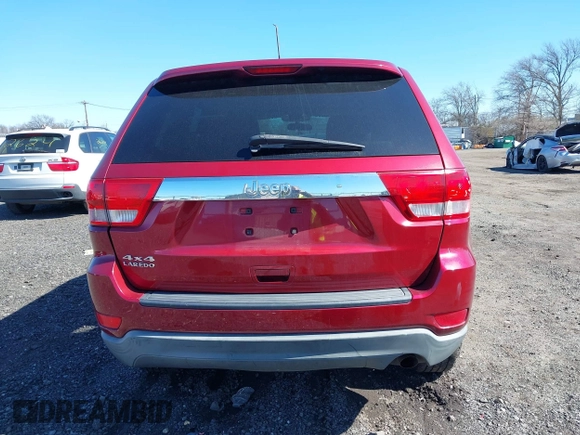 2012 Jeep Grand Cherokee Laredo with VIN 1C4RJFAG7CC297757, listed as a IAAI auction lot 41901645 with 270,731 mi miles. Bid and sale history available at carsss.com. Image 16.