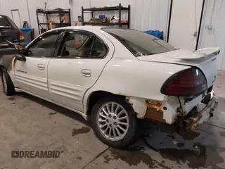 1999 Pontiac Grand Am SE2 with VIN 1G2NE52E4XM864232, listed as a IAAI auction lot 41321705 with 1 mi miles. Bid and sale history available at carsss.com. Image 3.