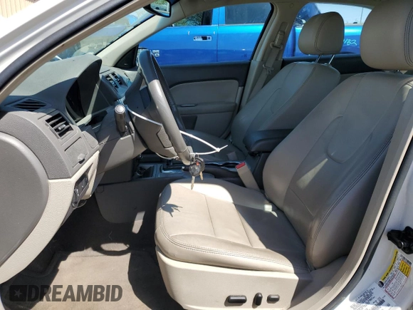 2012 Ford Fusion SEL with VIN 3FAHP0JA0CR432748, listed as a Copart auction lot 52360485 with 168,542 mi miles and Salvage Title. Bid and sale history available at DreamBid. Image 7.