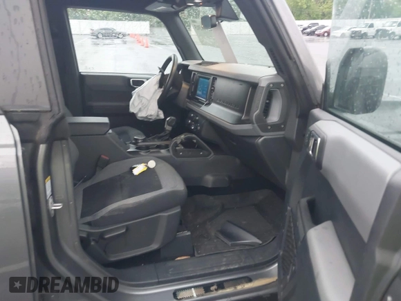2022 Ford Bronco with VIN 1FMDE5BH5NLB12538, listed as a IAAI auction lot 42161313 with 64,518 mi miles and . Bid and sale history available at DreamBid. Image 5.