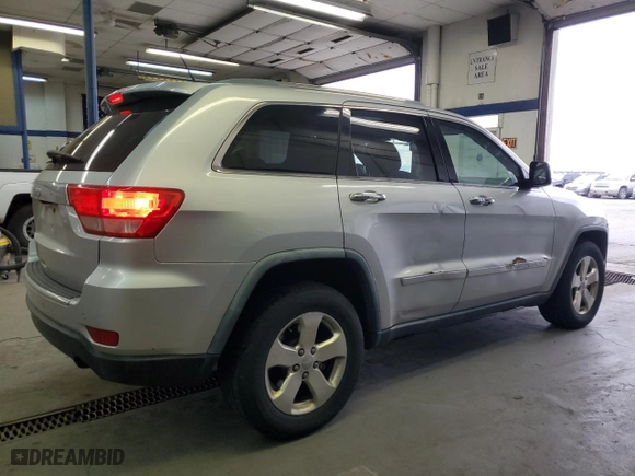 2011 Jeep Grand Cherokee Limited with VIN 1J4RR5GG3BC575251, listed as a Copart auction lot 49248985 with 199,962 mi miles and Salvage Title. Bid and sale history available at carsss.com. Image 3.