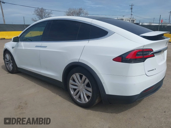 2016 Tesla Model X 70D with VIN 5YJXCBE24GF002020, listed as a IAAI auction lot 41799528 with 149,556 mi miles. Bid and sale history available at carsss.com. Image 3.