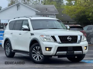 2017 Nissan Armada SV z VIN JN8AY2NC7H95049XX, wystawiony jako Copart lot #61907525 z przebiegiem 131 364 mil mil oraz Czysty tytuł • Clean title. Historia ofert i sprzedaży dostępna na DreamBid. Obrazek 1.