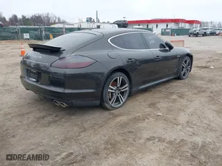 2010 Porsche Panamera S with VIN WP0AB2A71AL065137, listed as a IAAI auction lot 41810807 with 159,385 mi miles. Bid and sale history available at carsss.com. Image 4.